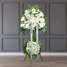 White anthurium and chrysanthemum standing funeral spray with green foliage