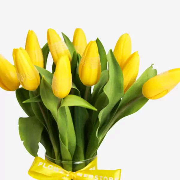 Yellow tulips bouquet with green stems tied with yellow ribbon, 10 stems