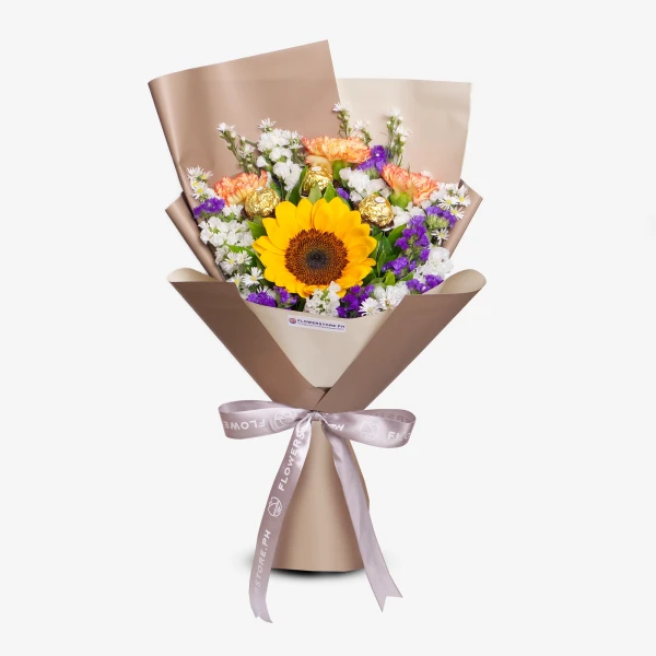 Vibrant bouquet featuring yellow sunflower, orange roses, white carnations, and purple statice with kraft paper wrapping
