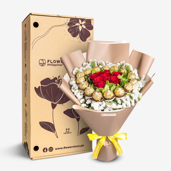 Elegant bouquet with red roses, white baby's breath, and chocolate candies in beige wrap