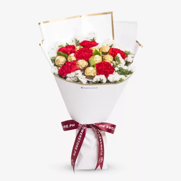 Red carnations and white chrysanthemums with gold Ferrero Rocher chocolates in white wrapper