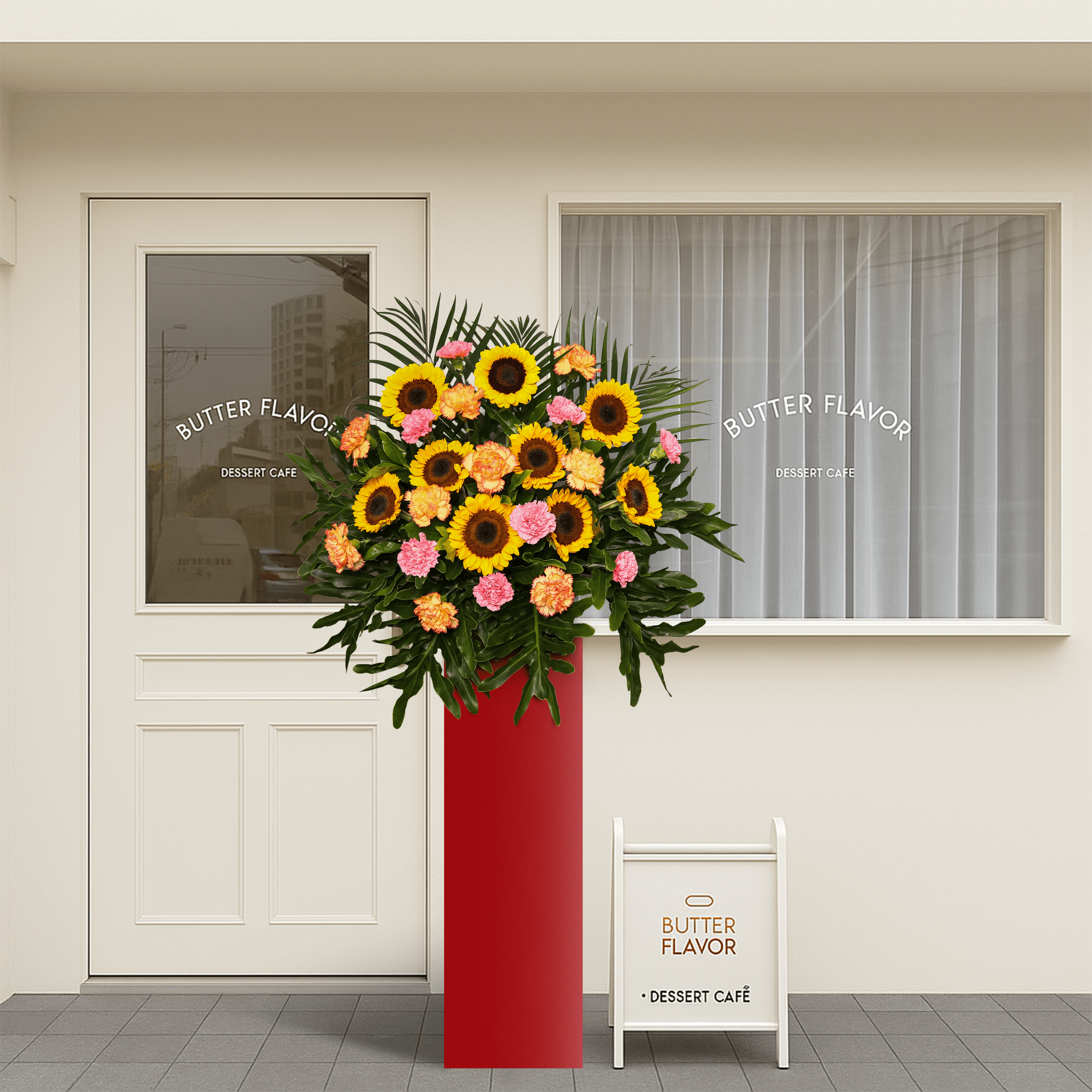 Sunburst Celebration consists of  9 sunflowers, 9 pink carnations, 2 orange carnations, and red wing leaves.