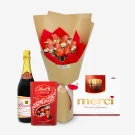 Champagne bottle, strawberry bouquet, Lindt chocolates, and Merci chocolates.