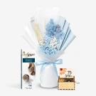 Blue preserved flower bouquet with Belgian chocolate seashells and a wooden music box.