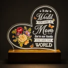 Heart-shaped lamp with flowers, butterflies, and the message "To the World you are a Mom, But to our family you are the World."