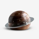 Wooden globe-shaped perpetual calendar with rings for days, dates, and months.