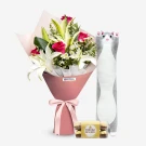 Bouquet of lilies and roses with a grey cat plush toy and Ferrero Rocher chocolates.