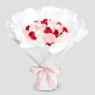 Bouquet of 30 red, pink, and white roses, wrapped in white paper and tied with a pink ribbon.