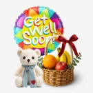 Get well soon balloon, teddy bear, and fruit basket with bananas, apples, and oranges.