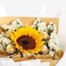 Sunflower bouquet with white filler flowers and Ferrero Rocher chocolates.