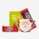 Santa mug with Hershey's chocolate, Kit Kat, almonds, and honey straws.