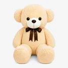 Cream-colored giant teddy bear with a brown bow tie, sitting against a white background.