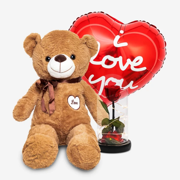 Teddy bear with a heart-shaped balloon that says "I Love You" and a preserved rose under glass.
