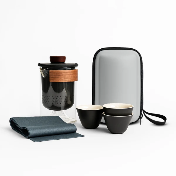 Tea set with glass jug, wooden band, three cups, and carrying case.