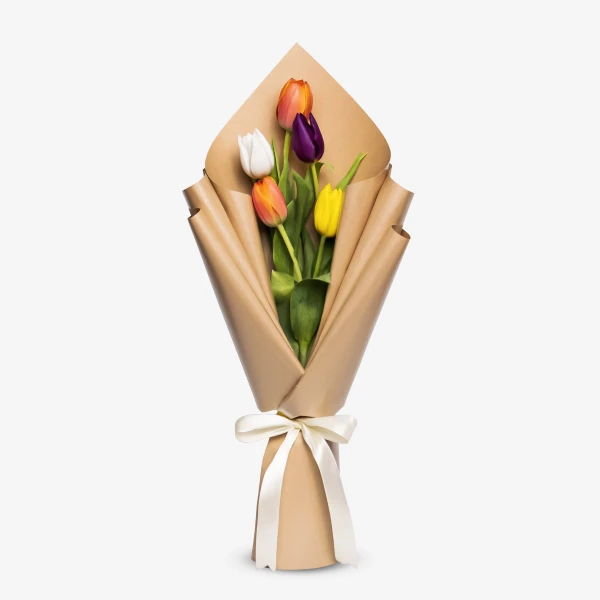 Bouquet of 5 colorful tulips wrapped in brown paper and tied with a white ribbon.