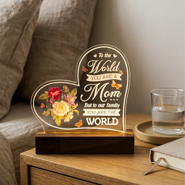 Heart-shaped lamp with flowers and butterflies displaying "To the World You are a Mom, But to our family you are the WORLD."