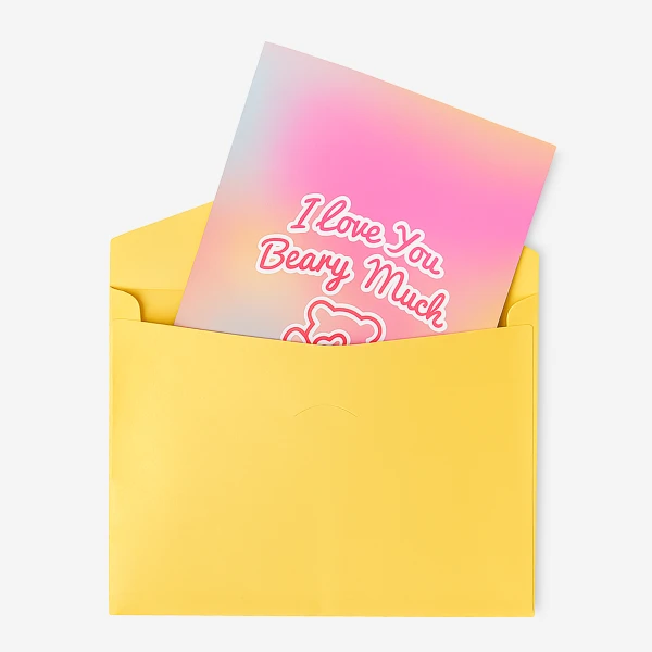 Yellow envelope holding a pink and purple gradient card with "I love you Beary Much" and a bear outline.