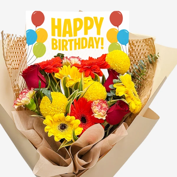 Birthday bouquet with red roses, yellow gerberas, and a "Happy Birthday!" card.
