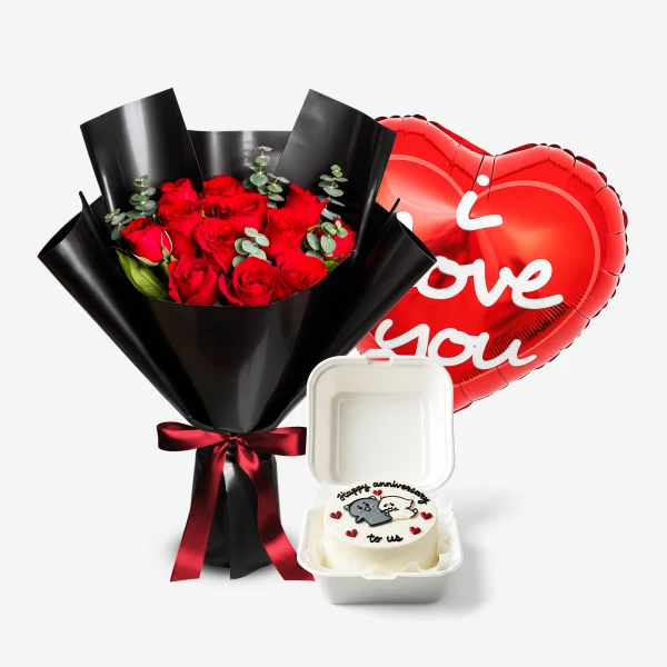 Red roses bouquet, "I love you" heart balloon, and small anniversary cake in a box.