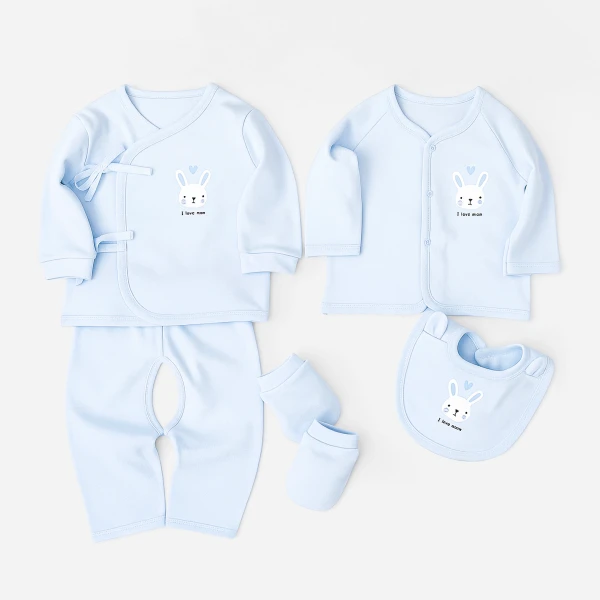 Baby boy clothes set with blue onesie, pants, bib, and mittens with bunny print.