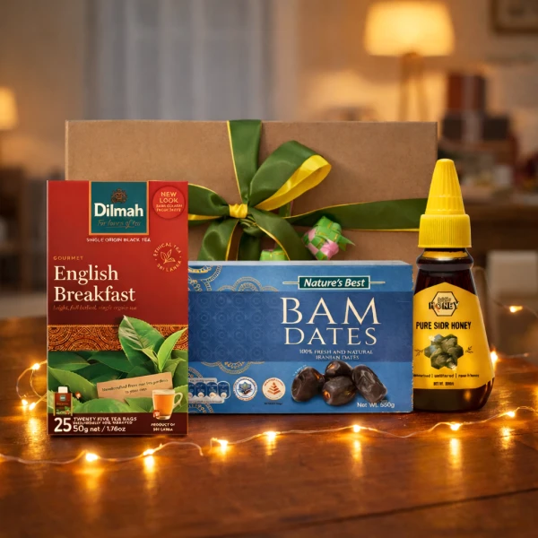 Gift box with Dilmah English Breakfast tea, Nature's Best Bam Dates, and My Honey Pure Sidr Honey.