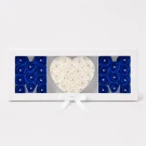 "Mom" spelled with blue and white roses with diamond centers in a white gift box.