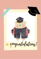 Cute graduation bear in cap and gown with "congratulations!" text.