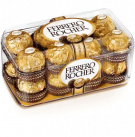 Ferrero Rocher chocolates in a golden box, featuring hazelnuts, crispy wafers, and chocolate.