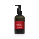 Bottle of Yahn Healing Body Wash with pump dispenser, red label with Thai and English text.