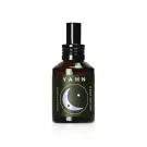 Dark amber glass spray bottle with a black label featuring a crescent moon and "YAHN MOON DEEP SLEEP".
