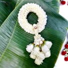 White fresh malai on a banana leaf.