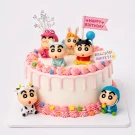 Shin Chan cake with pink frosting drip, fondant figures of Shin Chan and friends, and a "Happy Birthday" banner.