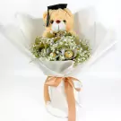 Graduation teddy bear bouquet with Ferrero Rocher chocolates and white gypsophila.