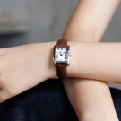 The watch dimensions are 24x30x6 mm, featuring a premium stainless steel case and a genuine leather strap