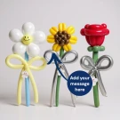 Three balloon flowers: a daisy, a sunflower, and a rose, each with a balloon bow.