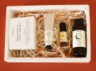 Gift box of Yahn skincare: soap, hand cream, rollerball, and face oil.