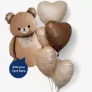 Brown teddy bear balloon with a checkered bow, surrounded by six heart balloons in beige and brown shades.
