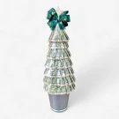 Christmas money tree made of folded Thai baht banknotes, topped with a star and green bow.