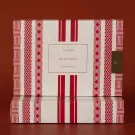 Gift box with red and white geometric pattern and "YAHN ART OF GIFTING" text.