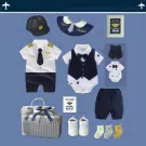 Baby pilot outfit gift set: romper, vest onesie, shorts, shoes, socks, bib, cap, suitcase, and card.