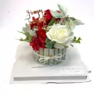 Money cake with red and white roses, money rolls forming the base, and a butterfly made of money.