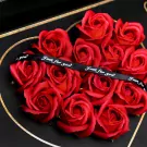 Heart-shaped arrangement of red soy wax roses with "Just for you" ribbon.