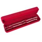 Two silver chain bracelets with infinity symbols in a red velvet box.