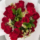 Bouquet of 24 vibrant red roses and small white daisies, elegantly arranged.
