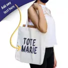 Woman with tote bag that says "Tote Marie" and "Add any text here" overlay.