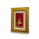 Framed Emerald Buddha in gold frame with red background and silk matting.
