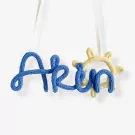 Knitted blue name 'Arin' with a yellow knitted sun hanging decor.