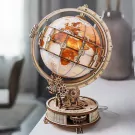 Wooden DIY globe with illuminated continents and rotating gears.