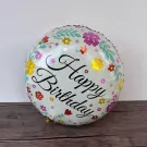 A round, white balloon with colorful flowers and "Happy Birthday" in script.
