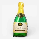 Green champagne bottle balloon with gold foil neck and label reading "Château Celebrations."